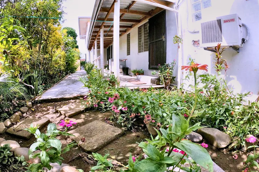 The planted garden approach to the Back Apartment entrance