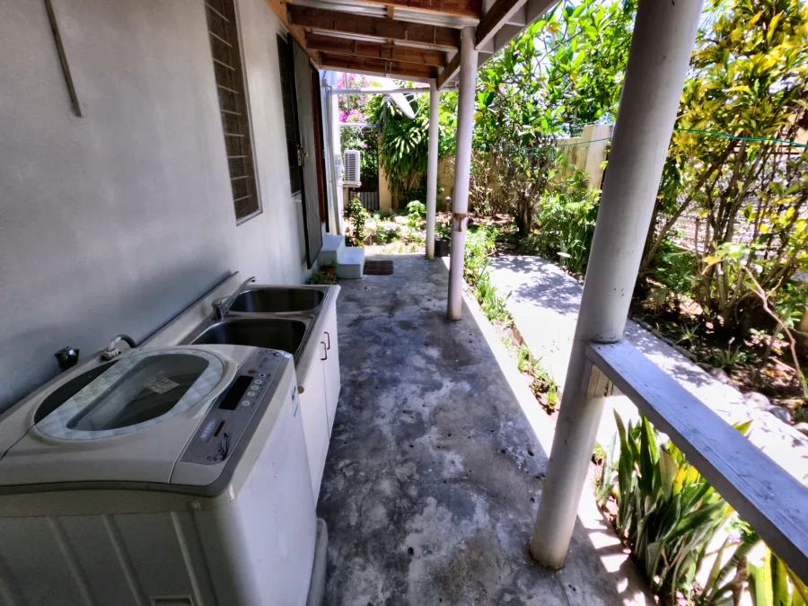 The laundry at the far end of the Back Apartment veranda