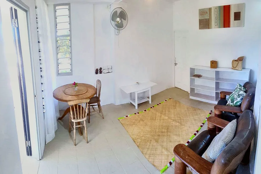 The lounge in the Middle Apartment, open through to the kitchen