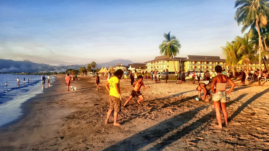 Late afternoon on the sand in front of the beachfront hotels at Wailoaloa Beach